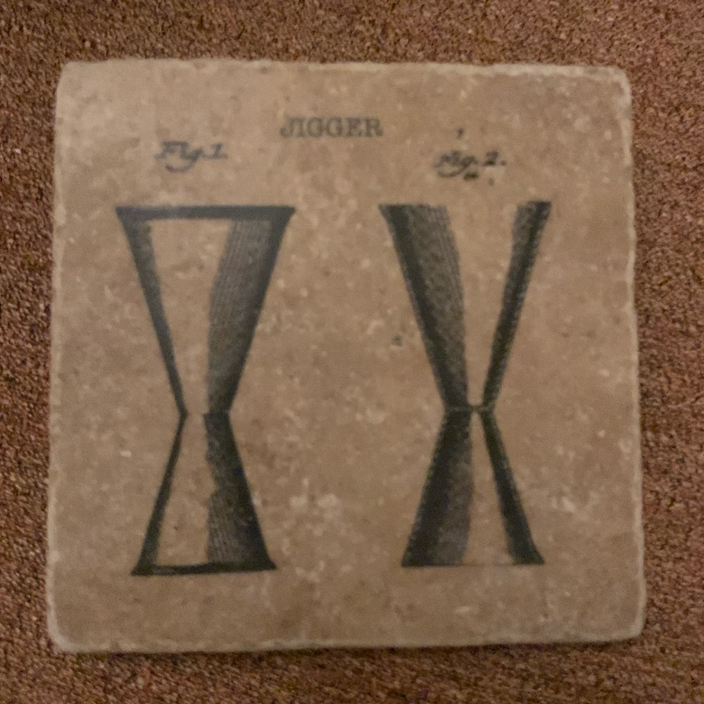 Set of 4
Dark travertine drink coasters.
Jigger, shaker, strainer, still